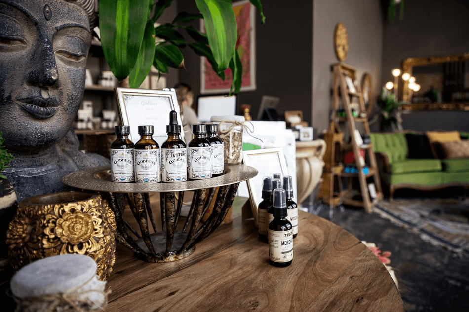 Interior view of Khroma Herbal Apothecary with a selection of organic tinctures in glass bottles